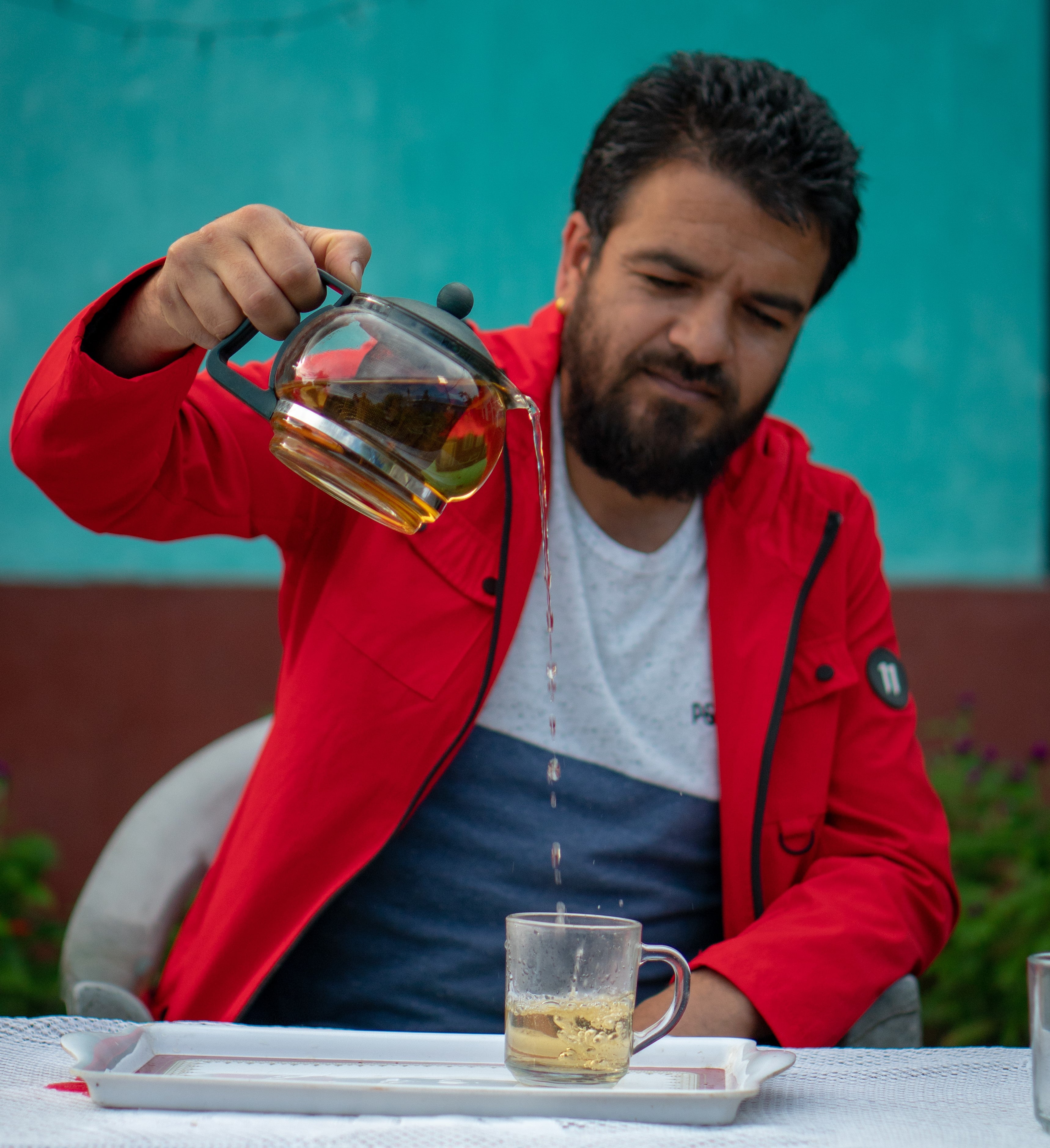 Man from Nepal drinking Black Tea