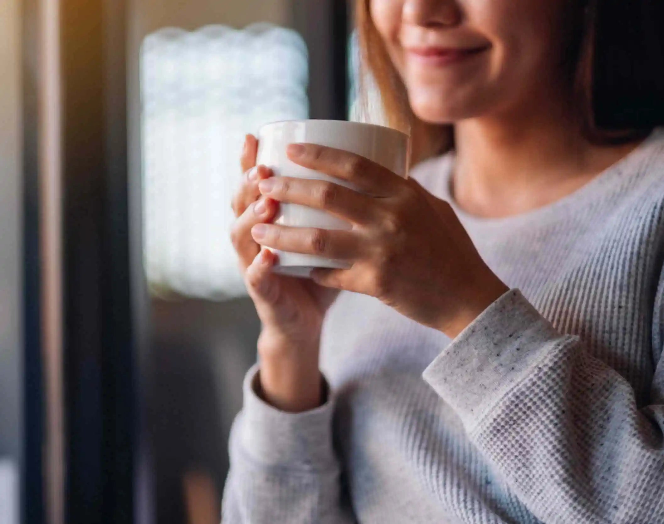 A lady with a cup of Tea