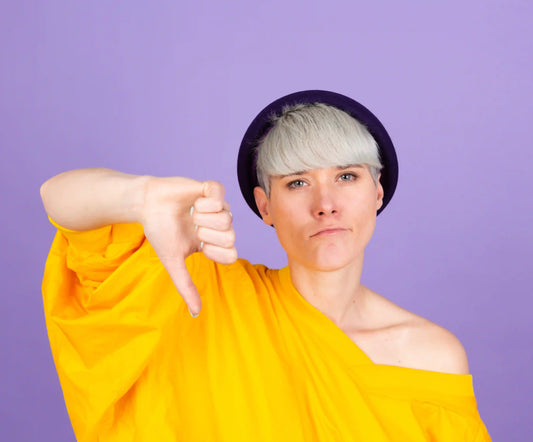 A person giving thumbs down